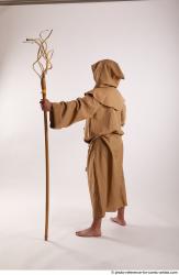 JOEL_ADAMSON STANDING POSE WITH A MAGIC STICK